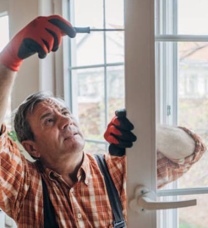 A worker installs windows